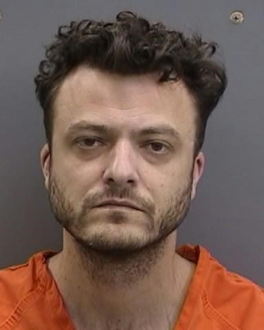 Booking photo courtesy of HCSO